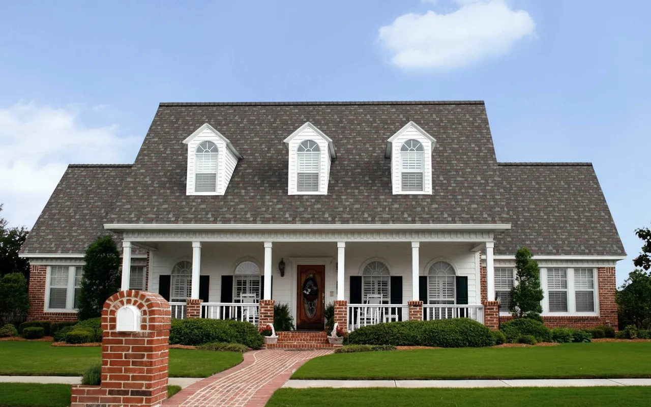 White house with Charcoal roof using Duration Colonial Slate