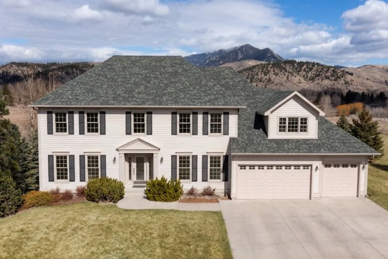 Colonial home with Charcoal roof -- Malarkey Legacy Storm Grey (front)