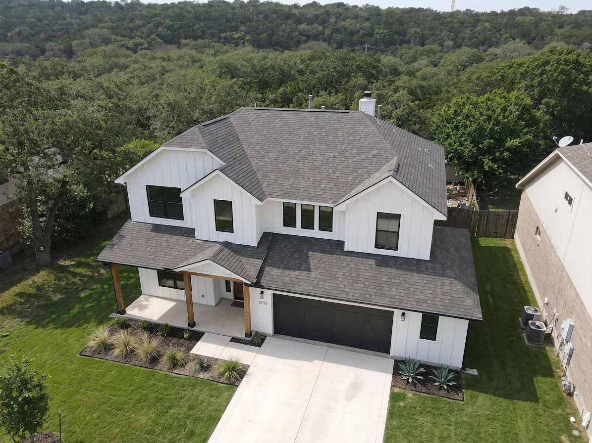 Modern Farmhouse home with Weathered Wood roof -- Owens Corning Oakridge Driftwood (right-34)