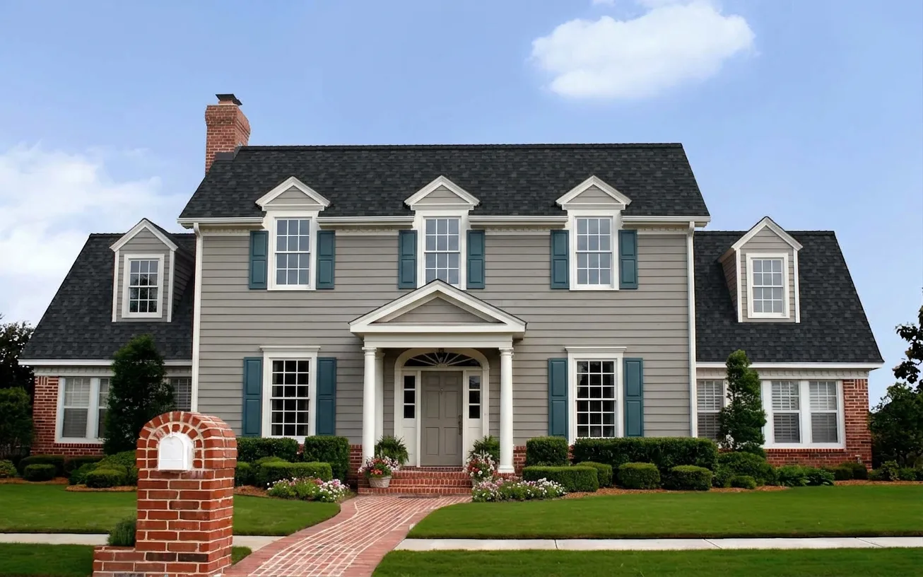 Traditional home with Black roof -- Owens Corning Duration Onyx Black (front)